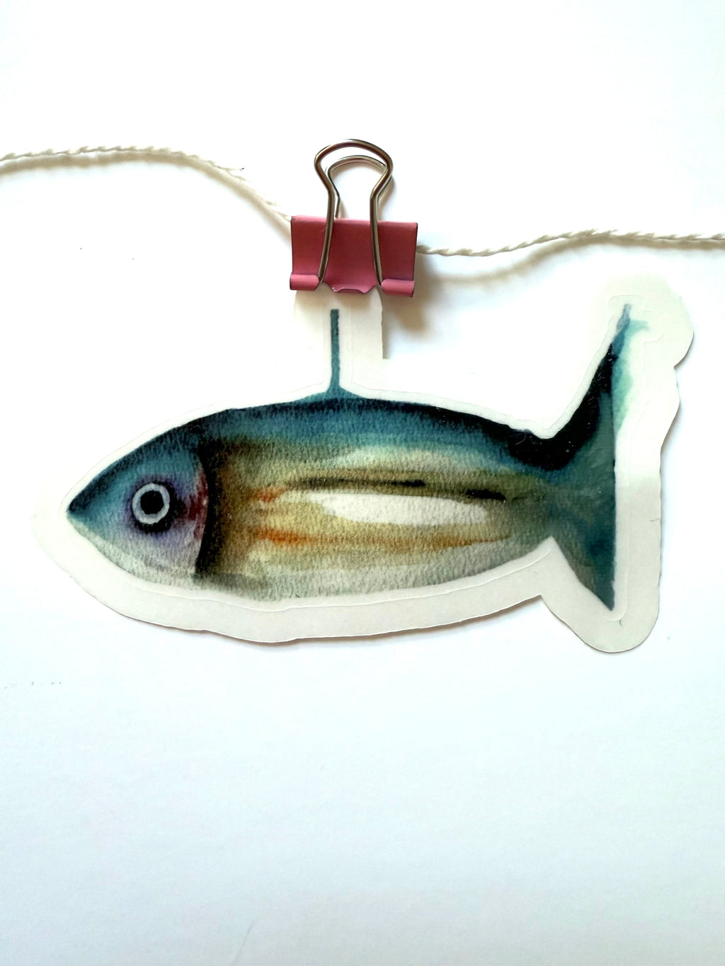 Teal and yellow fish from watercolor sketch