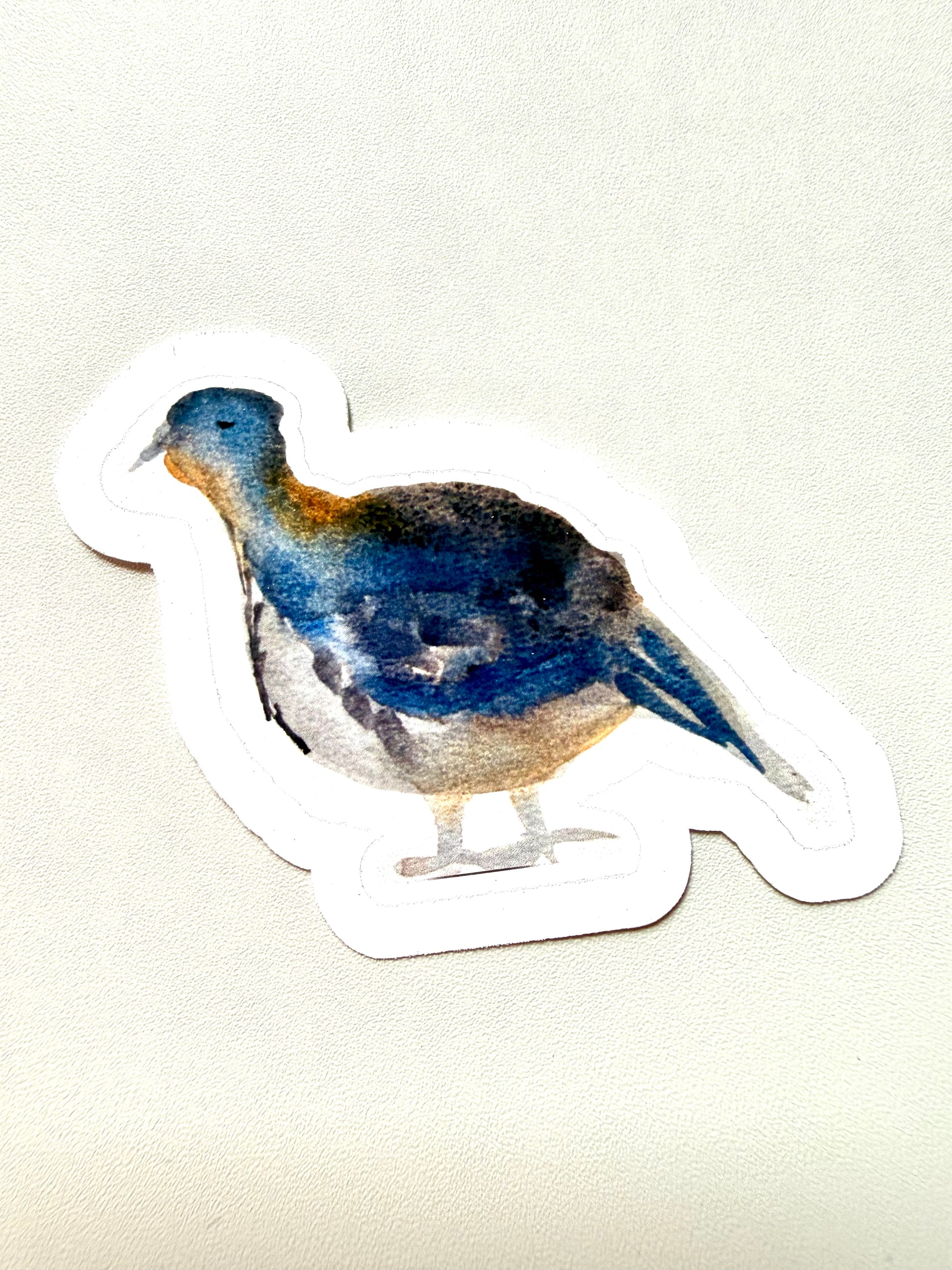 Blue and ochre bird sticker - from watercolor sketch
